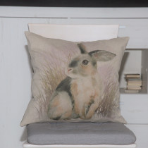 Kissenhülle sitzendender Hase